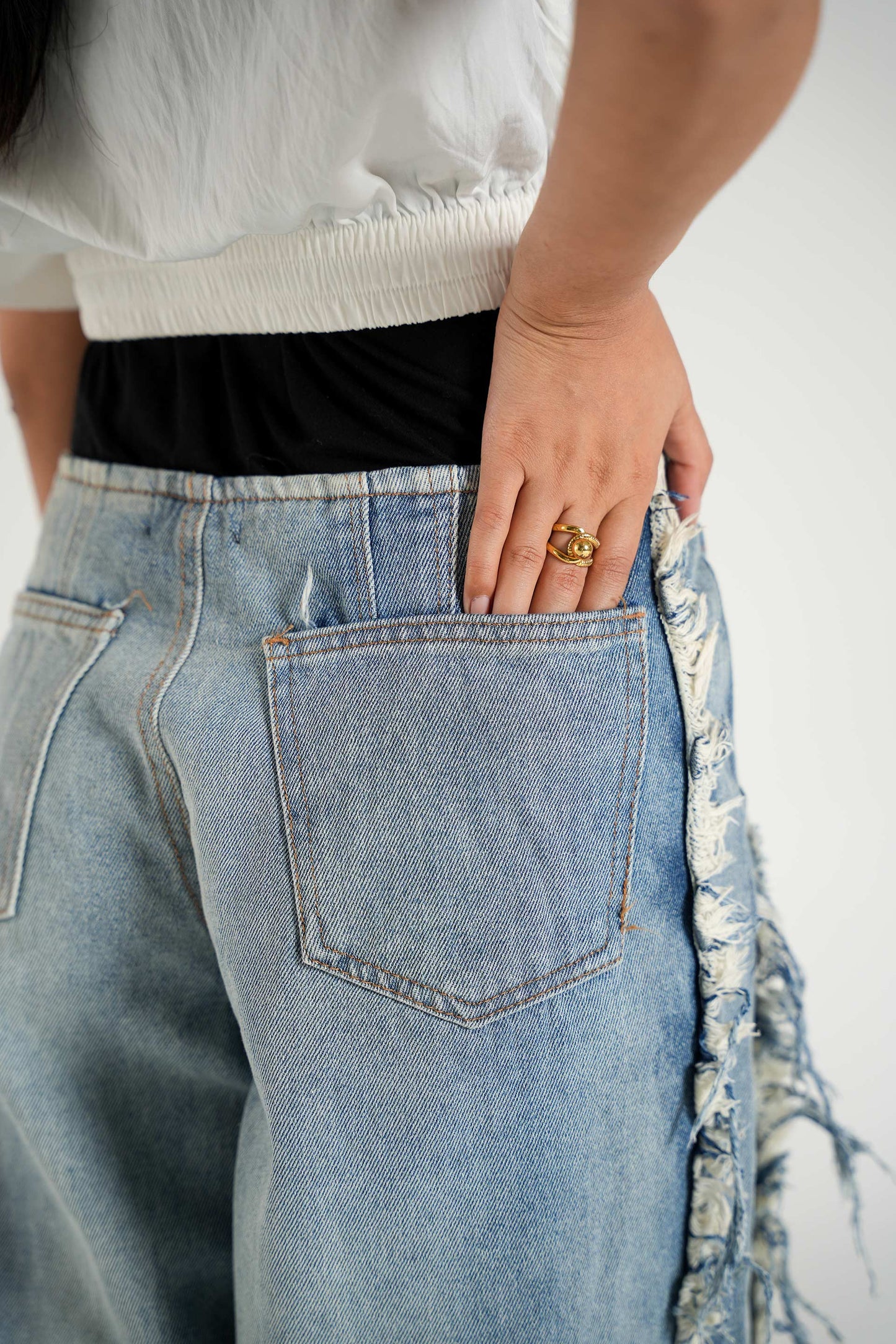PRETTY LITTLE THING NO WAIST BAND SIDE DISTRESSING JEAN